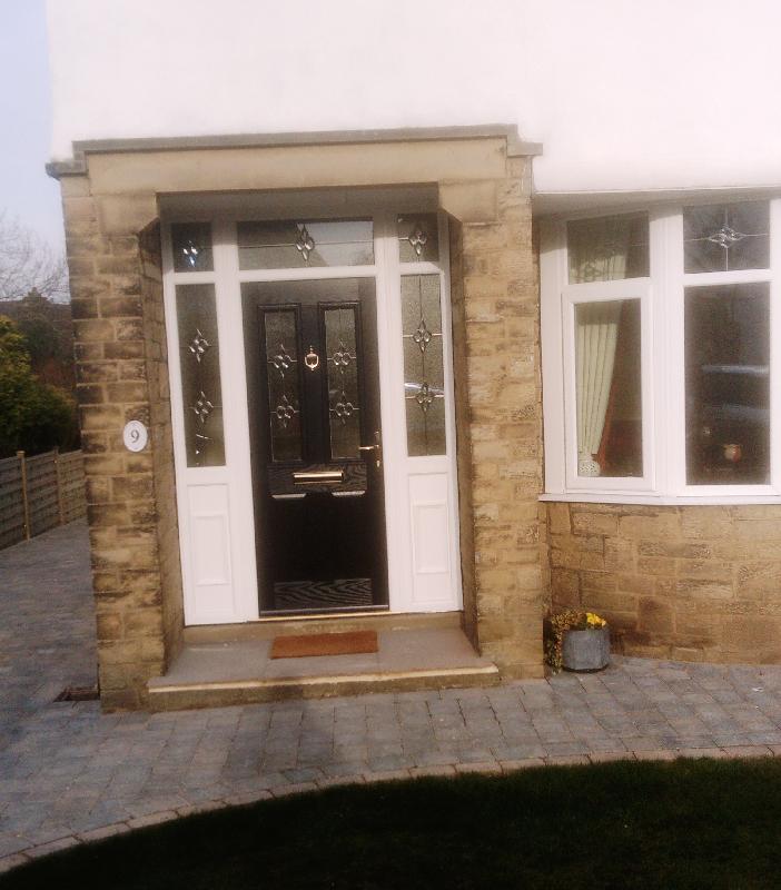 Excellent installation of new door and surround by Coral Windows