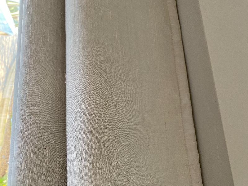 An Ivory Cotton lined roman blind in Amay fabric