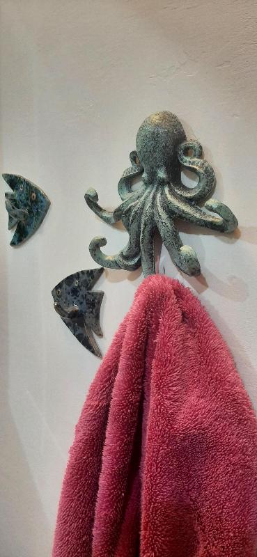 Useful and decorative octopus towel/clothes hanger.