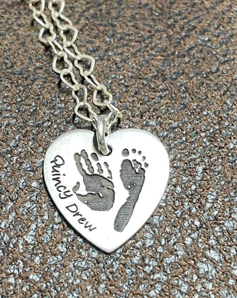 Handprint heart necklace is the most precious piece of jewelry I have.