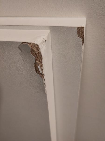 Cheap materials & soft protection results in damaged shelf corners